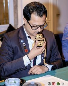 Judge with a trophy at an international cup