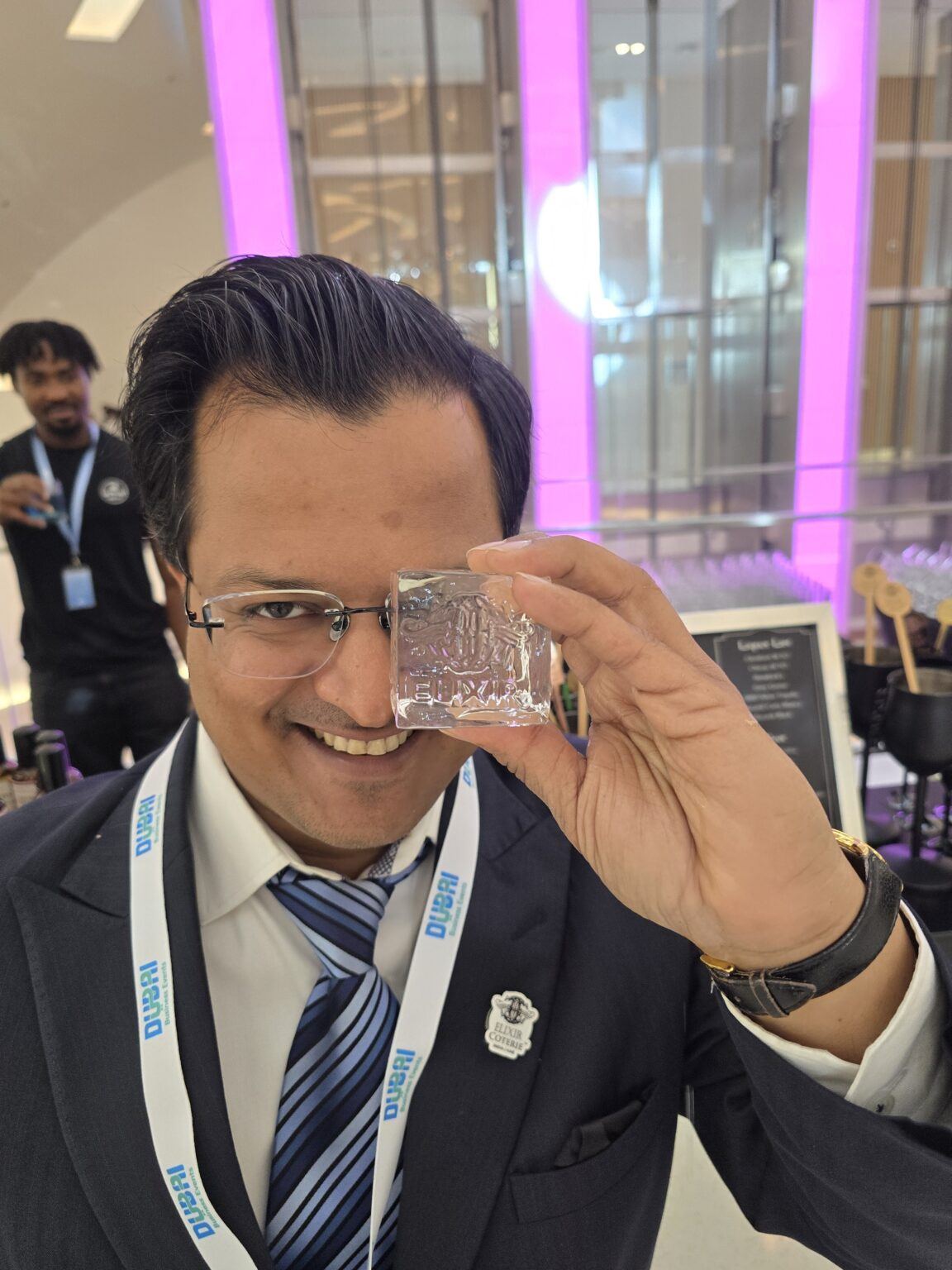 Judge tasting a cocktail during evaluation